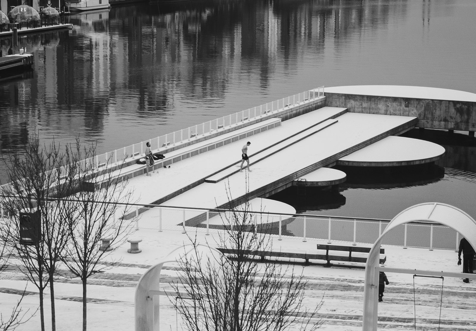 Swimmers walking on snow