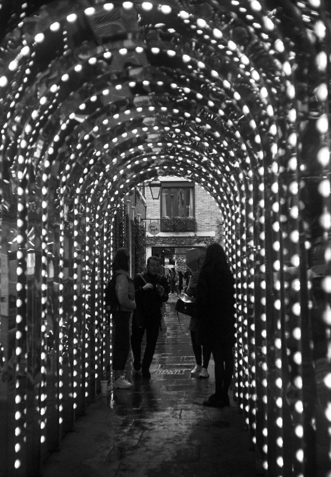 Tunnel lined with lights