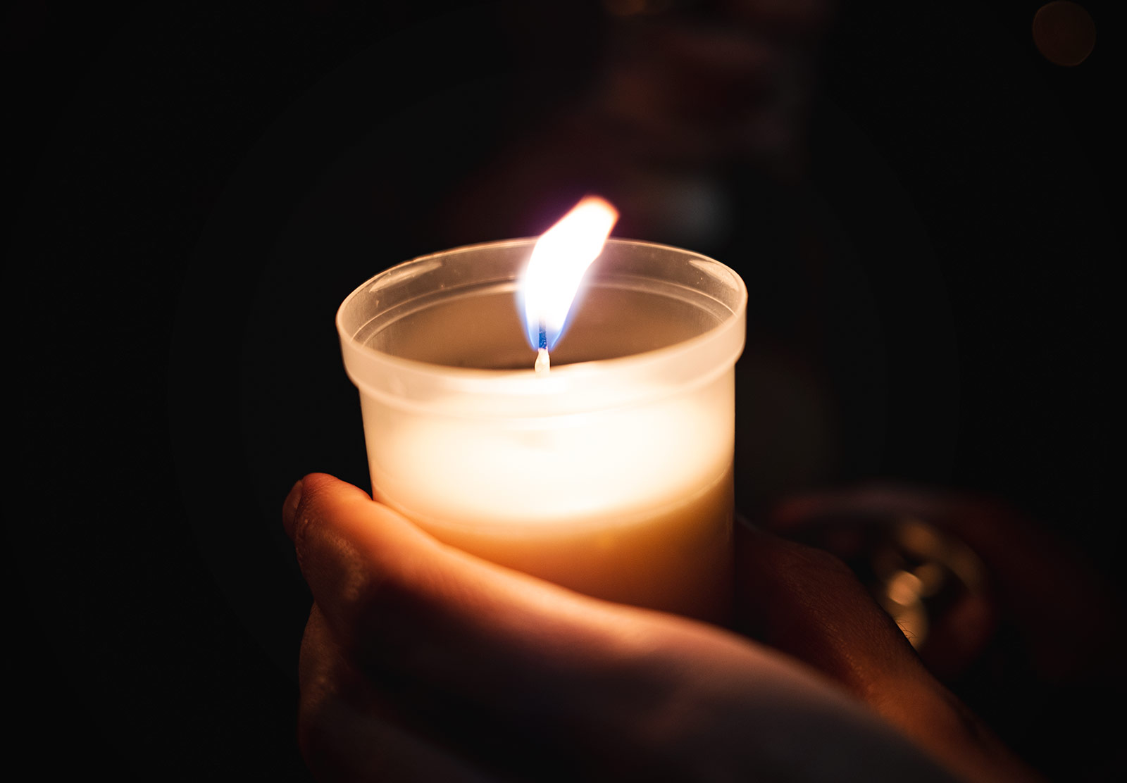 Closeup of lit candle