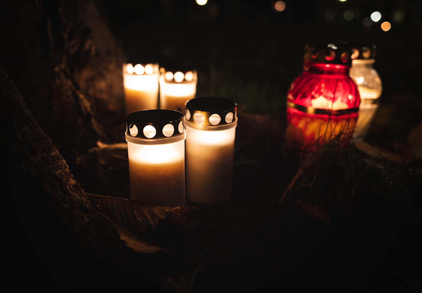 Candles at base of tree