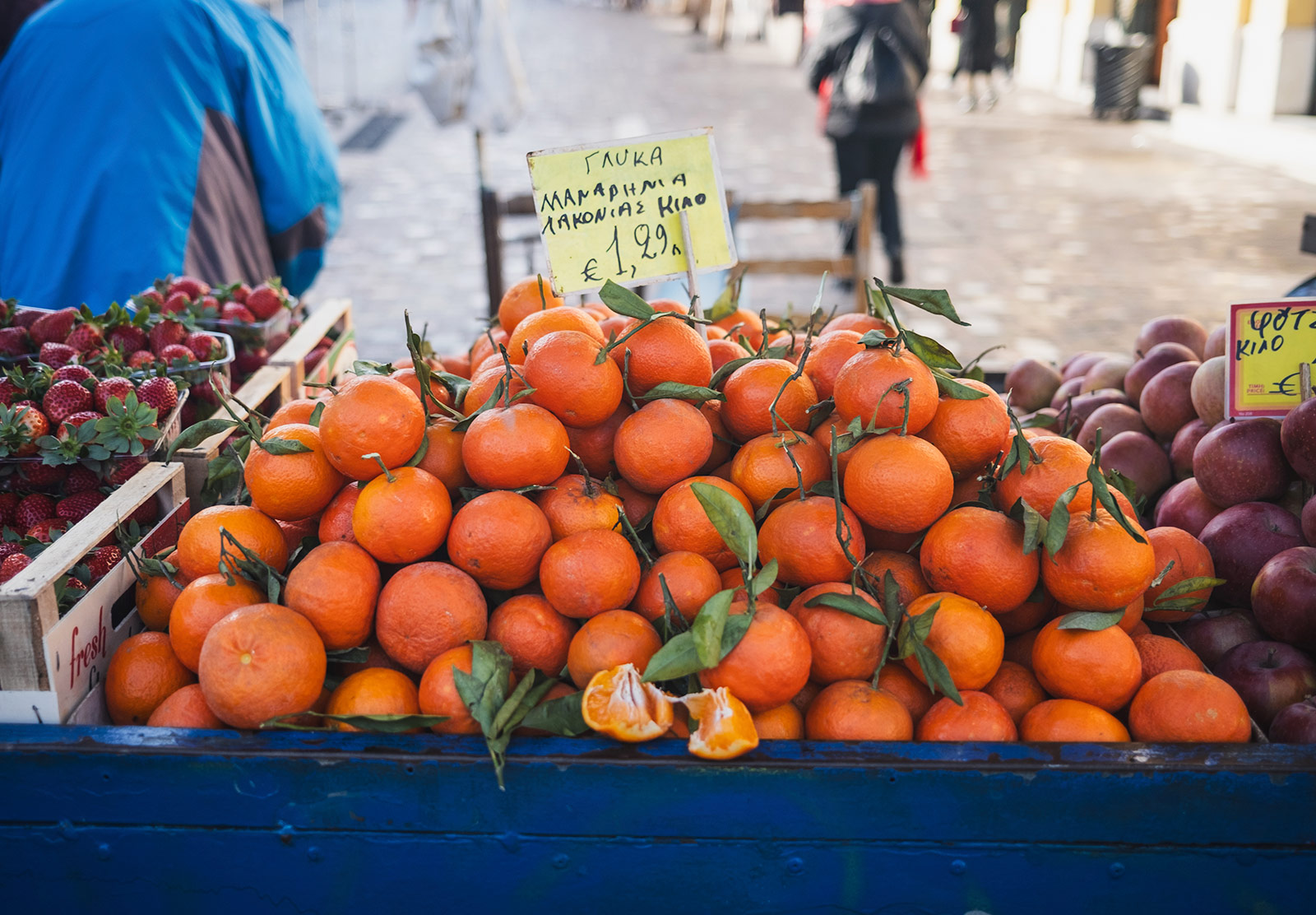 Pile of oranges on cart
