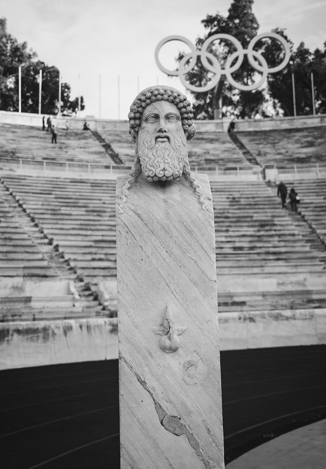 Stone head on a pillar