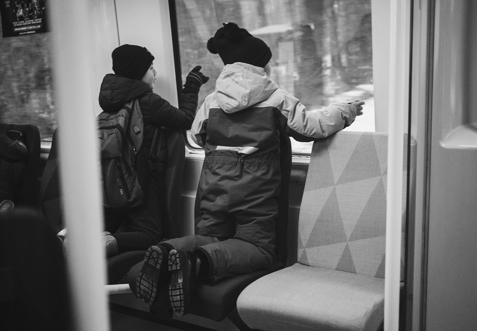 Children looking out of train window