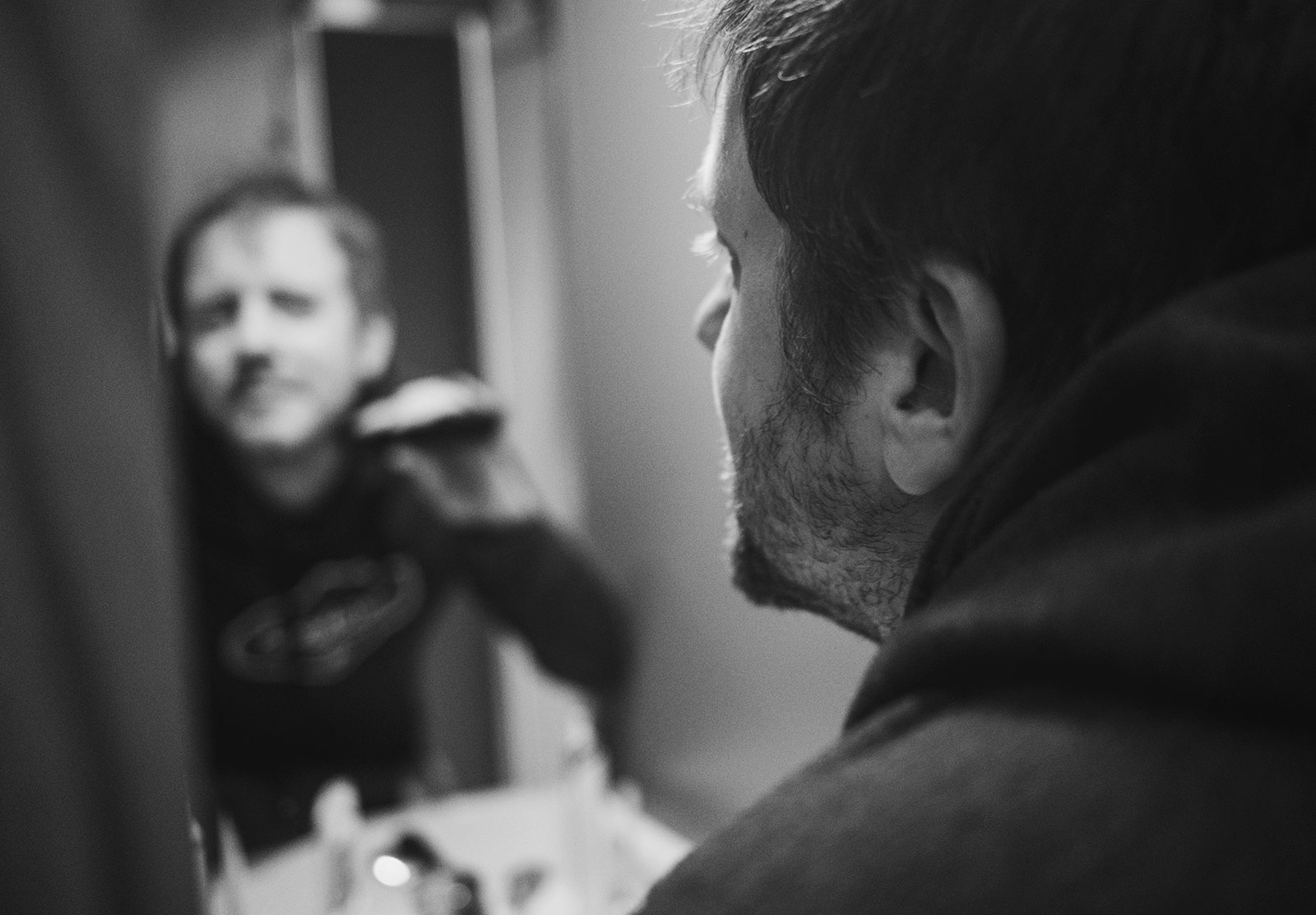 Man shaving beard