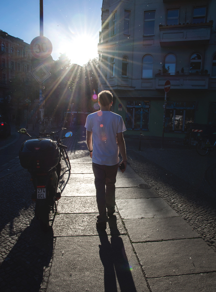 Man walking in sun