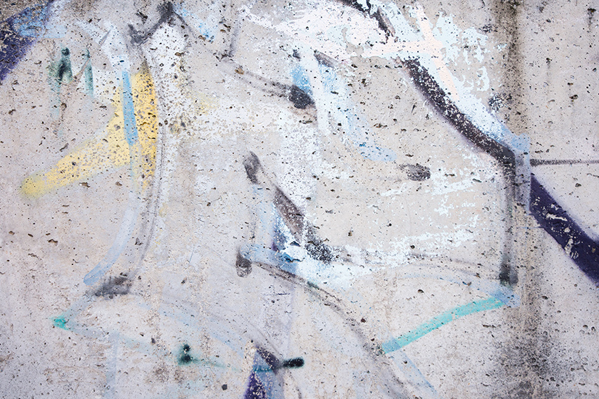 Worn graffiti on concrete