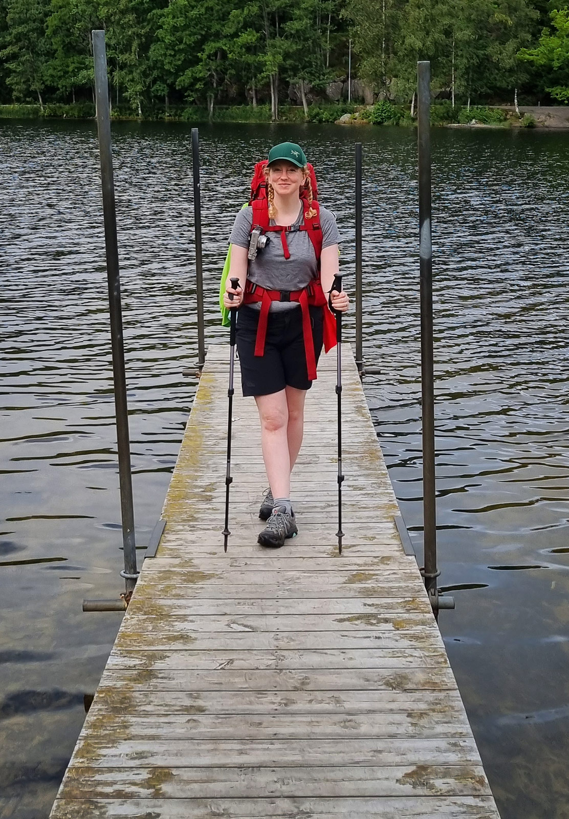 Woman stood on wooden jetty