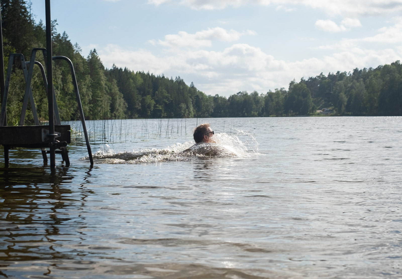 Man swimming in a lake
