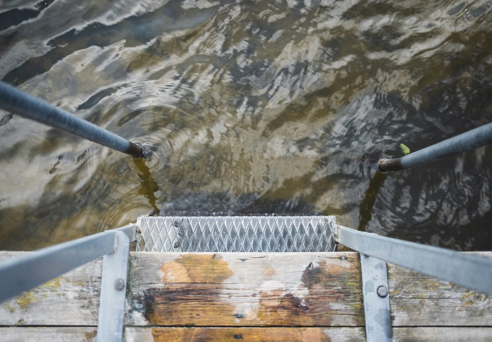 Peering down at clear lake water