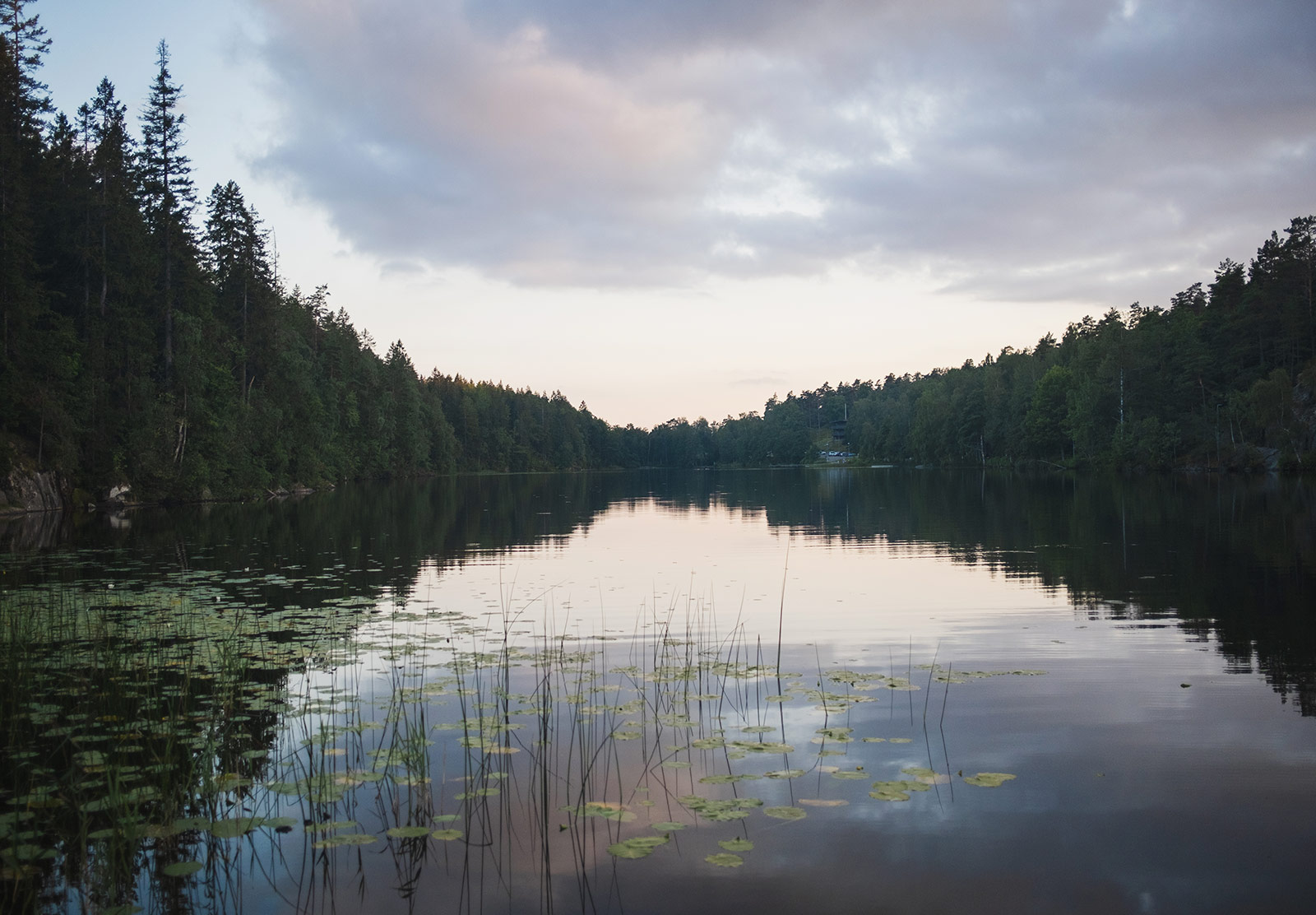 Sun setting over lake