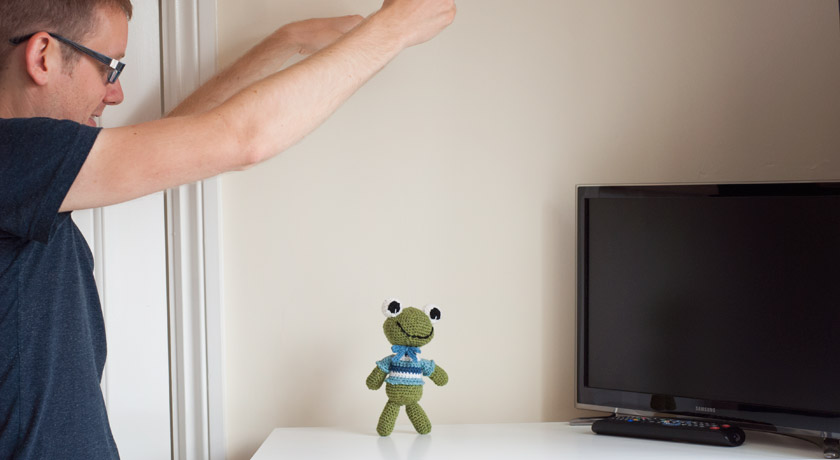 Felix the frog held up with string