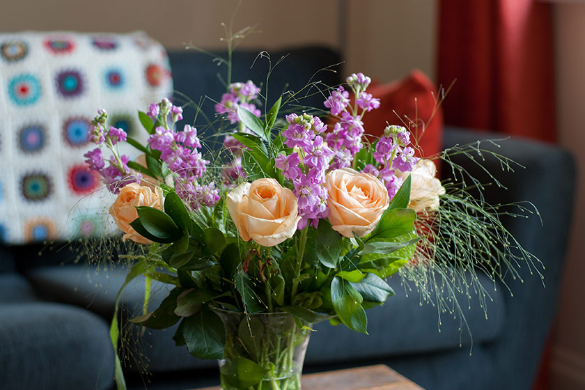 Vase of flowers on table