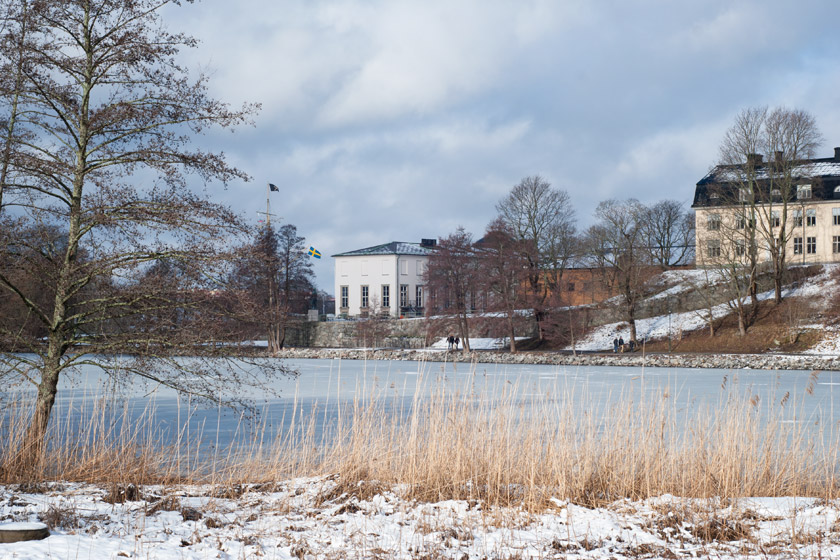 Building overlooking frozen lake