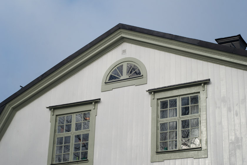 White and green wooden house