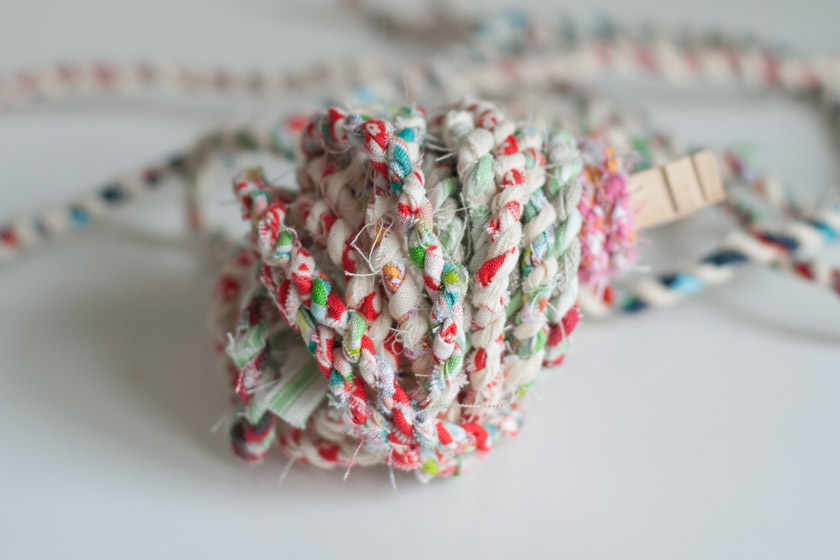Fabric twisted into twine