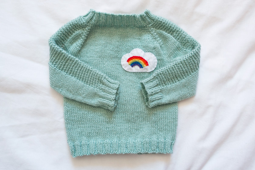 Green baby jumper