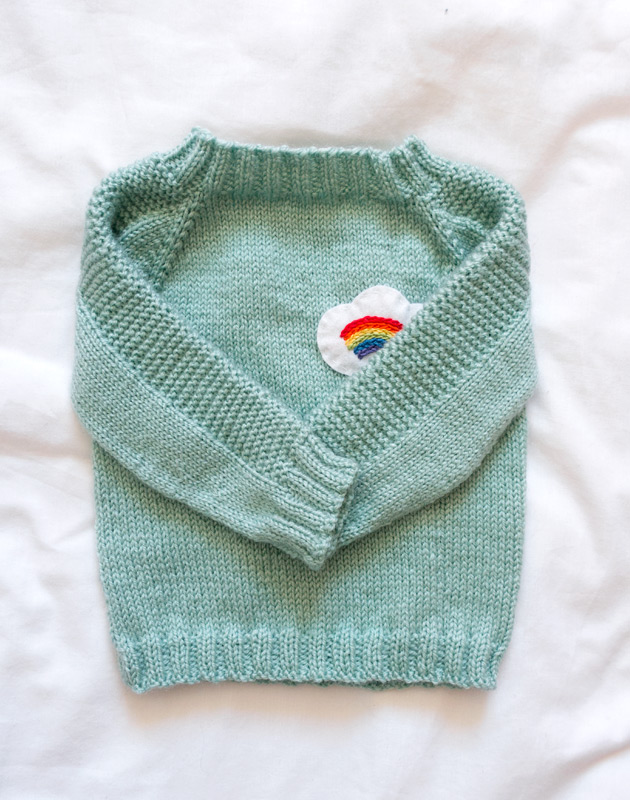 Green baby jumper