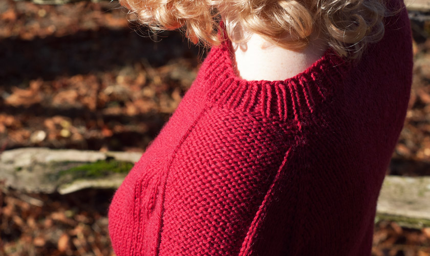 Red Flax pullover with neckline detail