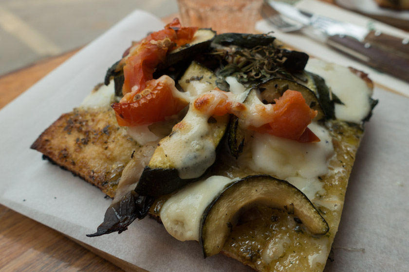 Focaccia topped with cheese and vegetables