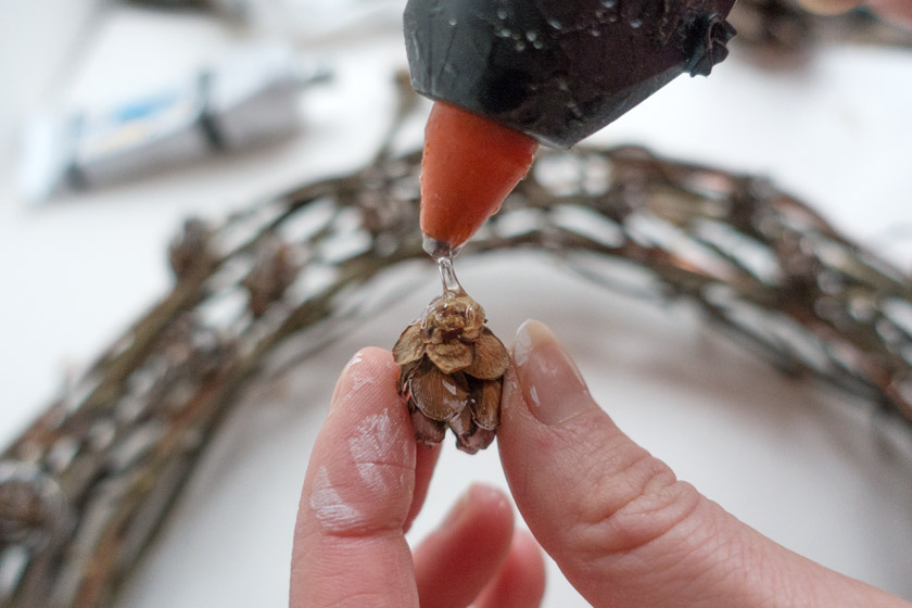 Glue gun and pinecones