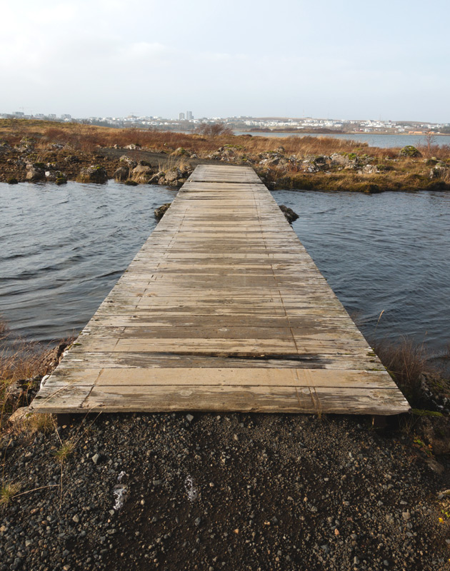 Wooden bridge over water