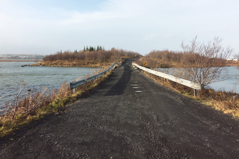 Black road over water