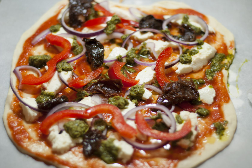 Mozzarella and vegetables on dough
