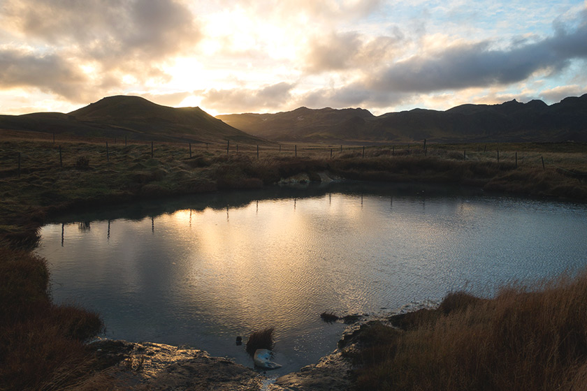 Mud pot at sunset