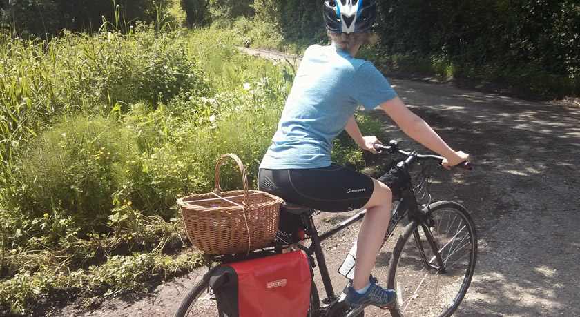 Wicker basket strapped to bike