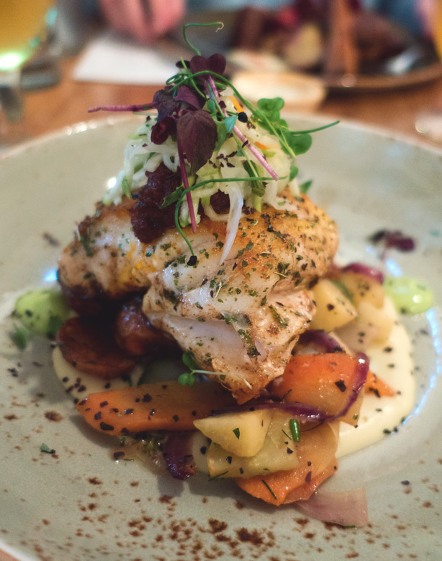 Fresh fish on vegetables