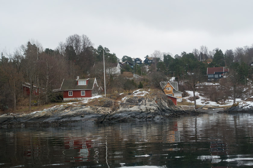 Wooden houses on waters edge