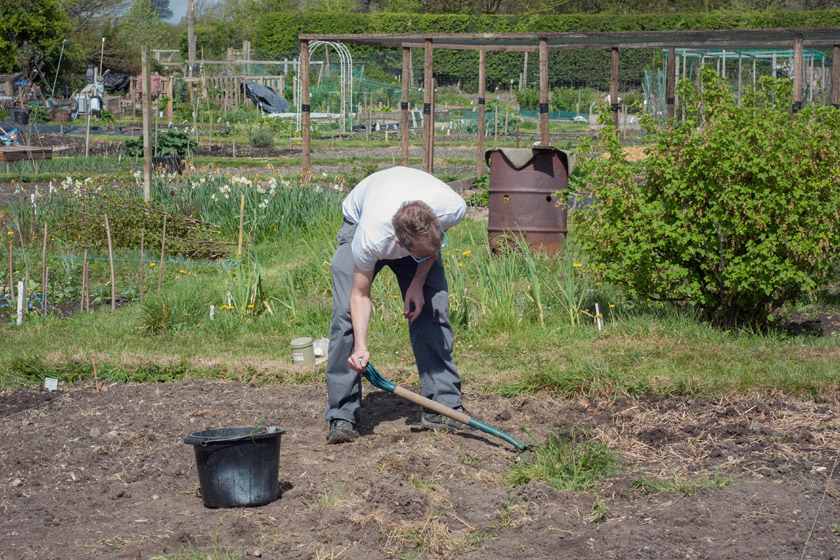 Scott digging soil