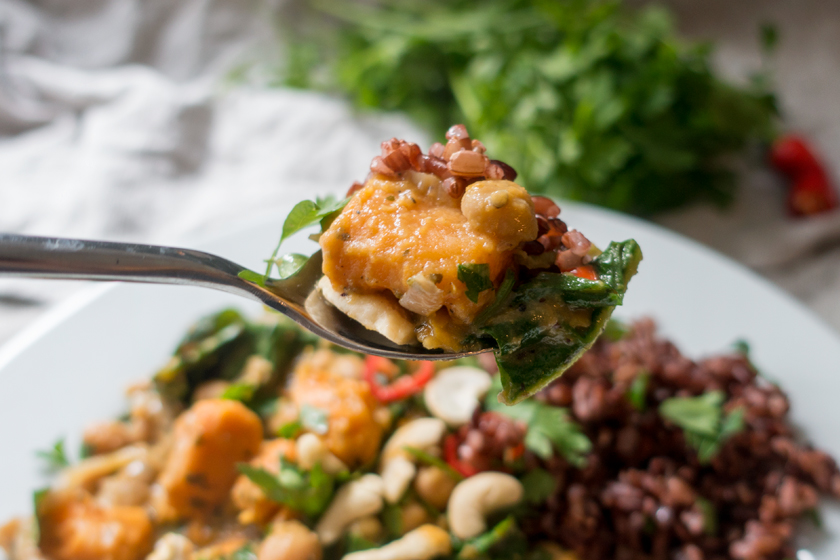 Vegetable curry on fork