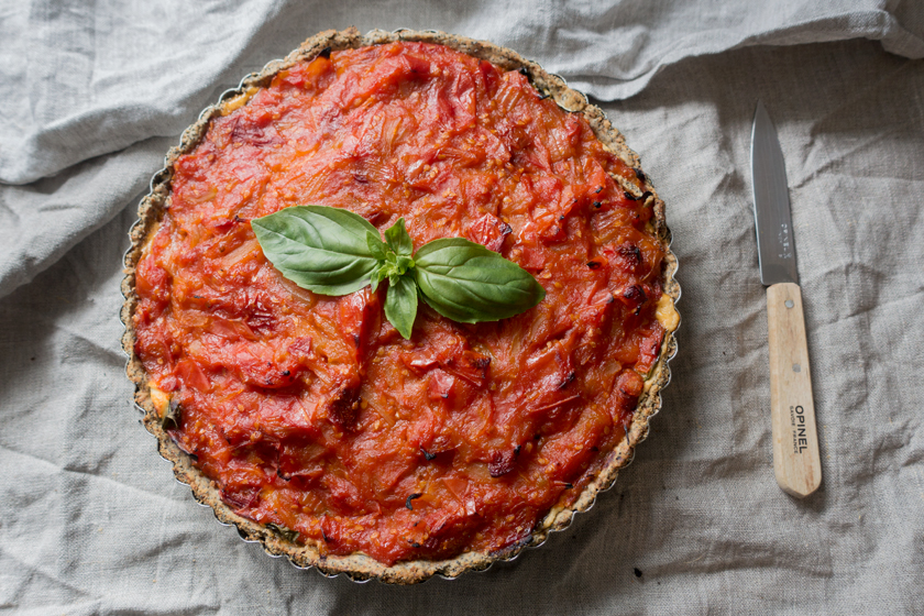 Tomato tart with basil garnish