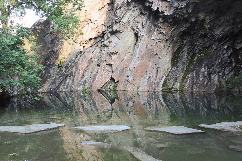 Rock reflection on water