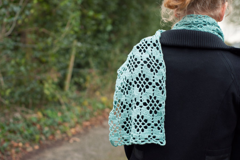 Scarf draped over shoulder