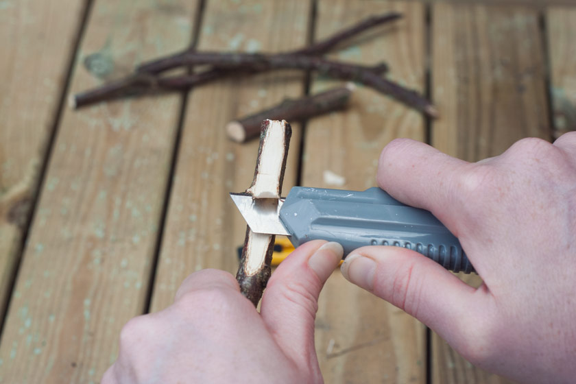Slicing wood with knife
