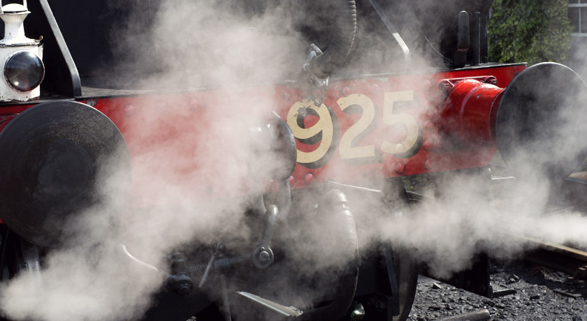 Steam rising around a train