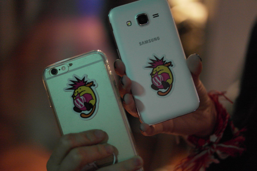 Wapuu stickers on phones