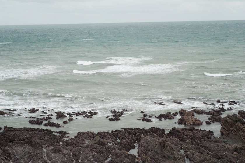 View over the rocks on the bay