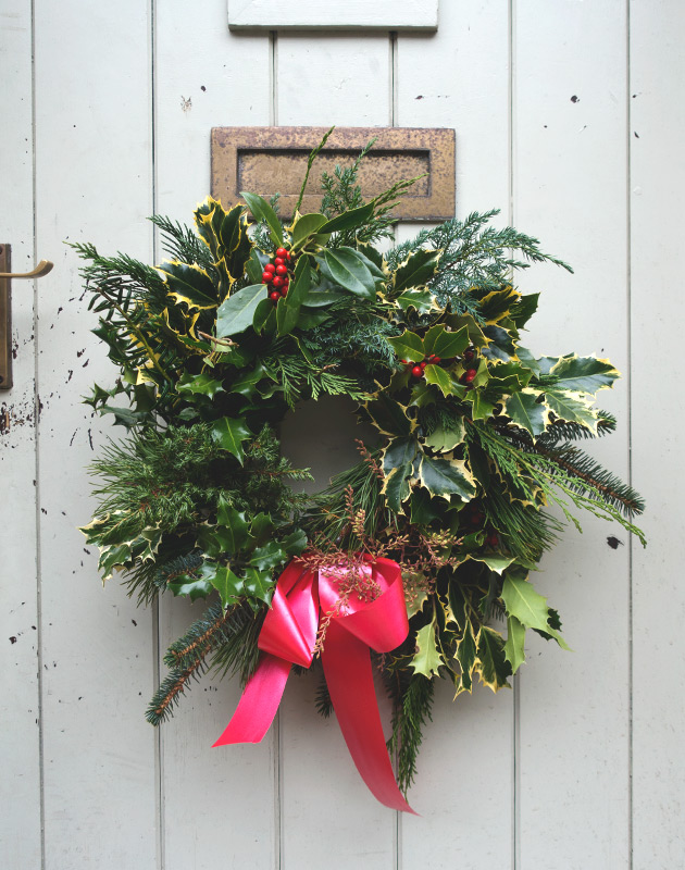 Christmas wreath on wooden door