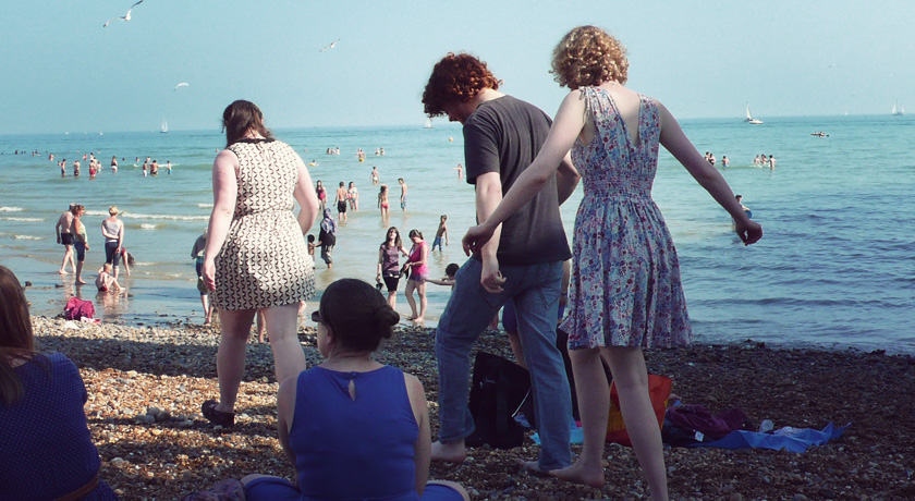 Walking along Brighton beach
