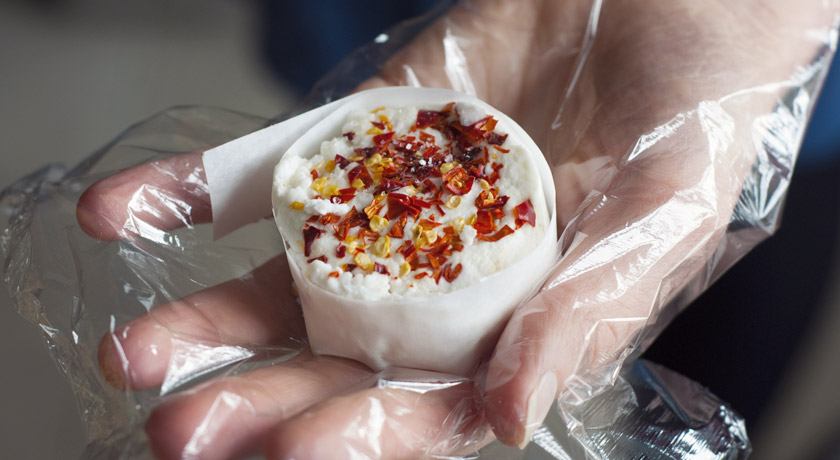 Homemade goats cheese topped with chilli
