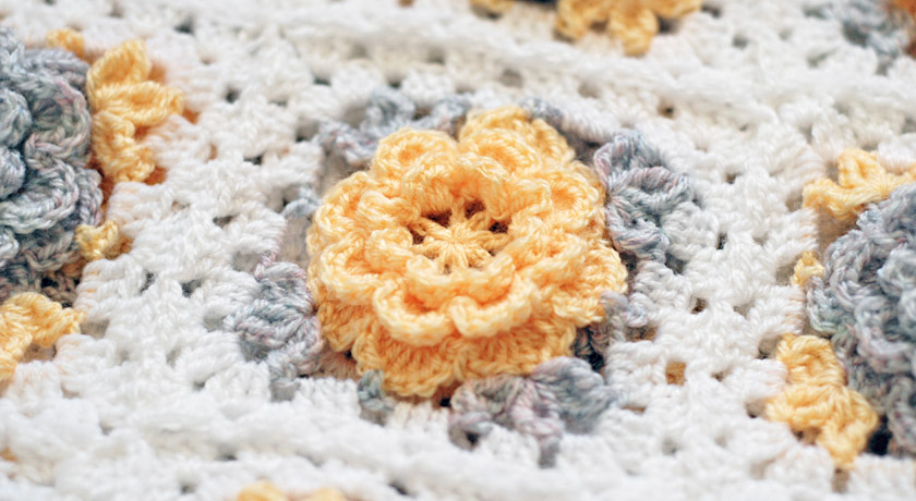 Yellow crochet flower blanket