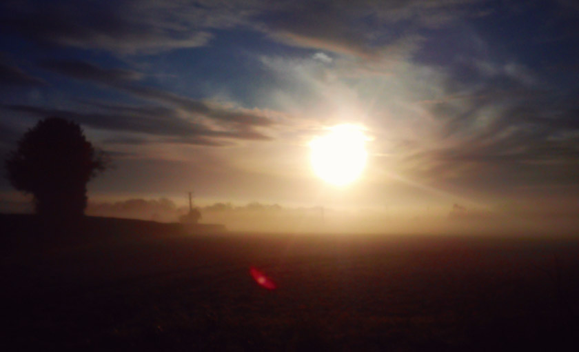 Sunrise over countryside