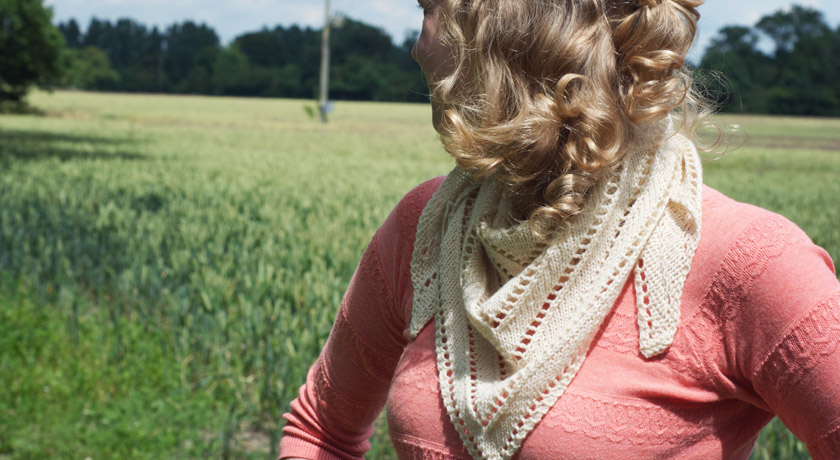Knitted cream triangle scarf