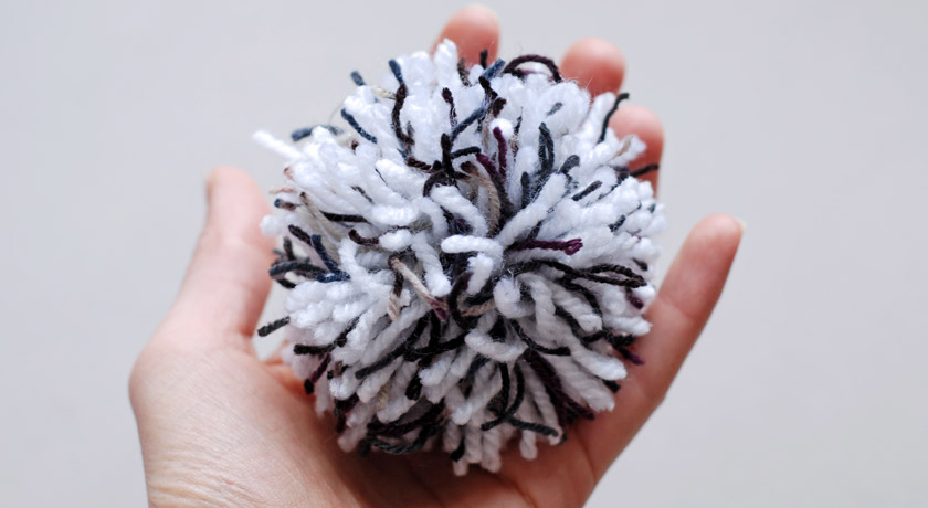 White wool pompom for Sense