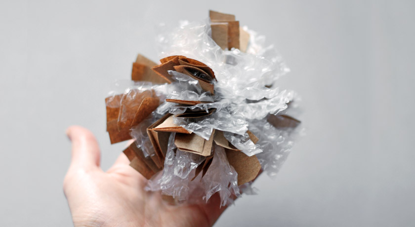 Bubble wrap and brown paper pompom