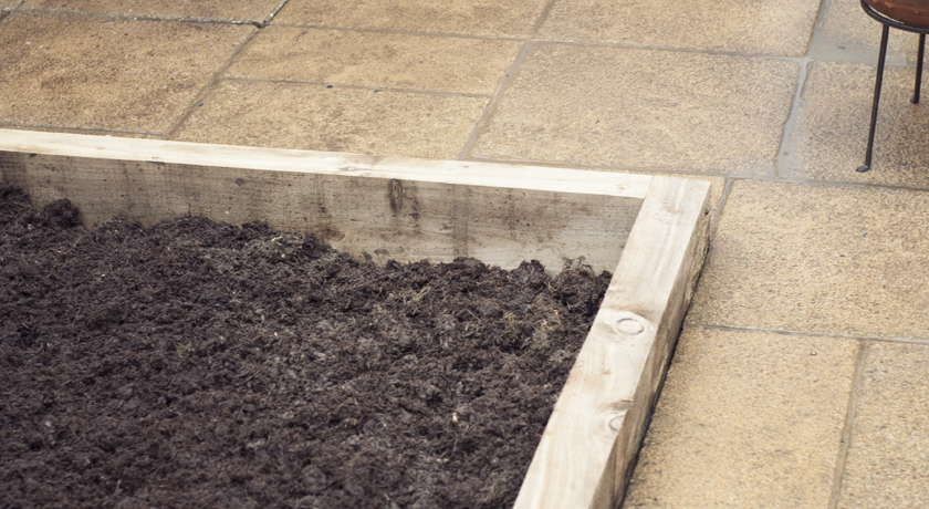Raised vegetable bed made from softwood sleepers