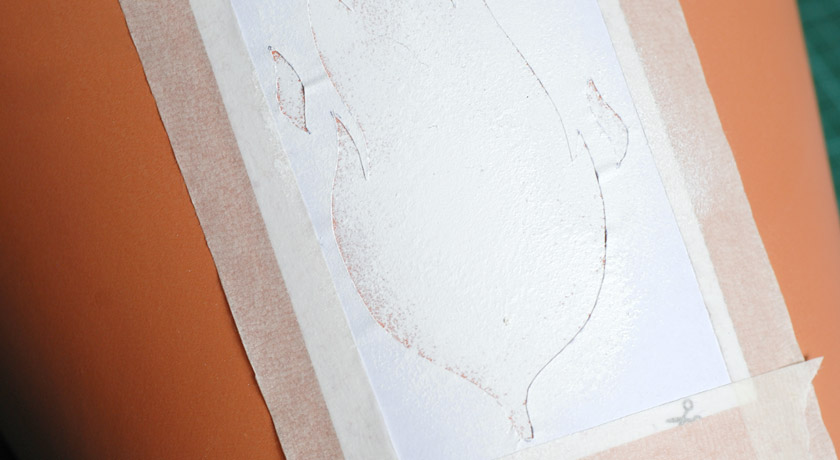 Terracotta pot with white leaf / flame stencil